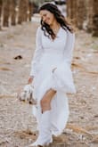 I chose this dress and I knew that I would make some changes to it. It arrived perfect, smooth and beautiful as it is, comfortable and perfect fabric. I added an addition of lace in the back and front and closed the neckline a little. Highly recommend. - Shosh L.