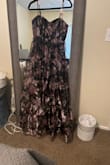 Fabric is really shiny and thin. Dress isway too long. I just didn't like it. - Cherie W.
