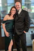 I sized up to a medium, usually wear a small. The small fit like a glove, but the medium was more comfortable for me with the high thigh slit. Love this dress! - Heather L.