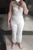 This is made for someone with a very short torso - I do have a relatively short torso, but it's not that short! The bustier just barely covered my bra without the crotch riding up and creating "unflattering" lines (iykyk). The fabric has a little stretch to it so it did mold to my body and fit around my larger hips and thighs, but the waist seam was completely inflexible, making it feel like I was being squeezed in half if I did anything other than stand up straight. I wanted to love it more than I did - too bad there's no size up from XL, and I bought it as a final sale item so there's no option to return. - Jenna D.