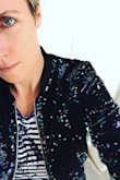 So I pulled this jacket off our racks on a whim one day when our AC the office was on a touch high and I was freezing, and I very suddenly fell so totally in love that I announced to everyone who would listen (and everyone who wouldn't) "OMG THIS JACKET IS AMAZING!!!!"
And it's true. Fits perfectly - not too roomy, not too snug - even for someone with slightly broader shoulders like moi. The sequins are some unicorn magic version of black, blue, green, and purple - which may sound a bit much, but it's actually pretty toned down with just the right amount of flash.
Throw it on to dress up jeans and a t-shirt or toss it over a fancy dress for a night out. It's a keeper. - Noelle S.