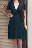 This dress was given to me as a birthday gift and I love it! It feels so nice on and is flattering. I love the split sleeve detail too! - Nancy L.