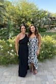 I wore this dress for an outdoors wedding in Palm Springs in 107 degree weather. This dress was perfect as it did not show any traces of sweat. It's light and fits true to size. The straps adjust which is nice and the tummy area is fitted but not so much that you can't hide a little tummy bloat. I am 5'4" and wore a 4'' heel and the dress did touch the ground a tiny bit in the back, so you couldn't wear it with flats unless you were at least 5'8". - Georgina P.