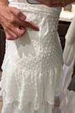 I ordered a size S. The dress fits perfectly and is beautiful, but the material is not great. The sides ripped. I noticed it when I got home after graduation. I wore the dress for only 5 hours. I would like to get a refund or exchange. I love the dress, but I am disappointed that it is damaged after the first use. I would like someone to contact me. Thanks. - Paula C.