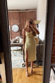 Beautiful dress and color. Fit was perfect! Didn't need to wear a bra and felt supported. Slit was the perfect length. Wish there were more colors!! - Sarah G.