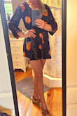 This romper is very cute, but it is short so make sure you are not having to bend over, too much... Perfect for a summer evening out with the girls in Florida. I did end up pinning the deep V neck a bit so it would not gape. I have a shorter waist so there wasn't any issue with it riding up. - Tiffany A.