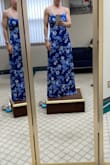 Beautiful dress! It was long on me even with 3-inch heels. I just had it hemmed up to fit my height and I love it. Light material. - Samantha P.