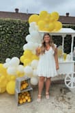 It fit great! I am larger chested and it was perfectly snug for me. Such a cute bridal shower dress. - Kalie B.