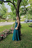 The fit was absolutely perfect, it was like it was made for me. I did check the measurements before ordering, so make sure to check those before you purchase the dress. I wore 2 (3/4) inch heels and the length was perfect that way. The material is very good, there are layers so nothing is see through, it falls down great. The dress is absolutely gorgeous, I have received so many compliments and I felt beautiful the entire day. I don't regret buying it for one second, and I kind of want it every color now to wear it to all other weddings in the future. Buy it! - Sarah N.