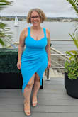 I needed to find a dress that hugs my curvy self in all the right places but wouldn't be too thin (to show sweat). This dress has a great amount of stretch in the hips and nice support for the girls. I wore those cakes on them to prevent sweat and keep them even more in place, and they didn't show nor move!
The slit is sexy but not too revealing. Only thing is I did have to adjust it while getting down on the dance floor.
All in all, it was the perfect dress for a beachside summer wedding! - Allison F.