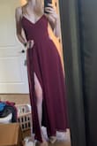 The material hangs nicely and feels comfortable. I don't really like the straps in the back nor do I like how high the slit goes up my leg. - Evie P.