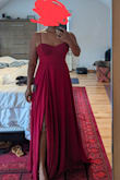 This dress fits true to size but is very long for me at 5'3. Even with 3 inch heels, it was still dragging on the floor and would require hemming. I love that you don't need to wear a bra. The dress came with a rip in the seam, and there were dark spots on many areas of the fabric. Quality control was seriously lacking with this one. I would have kept it and made the alterations, but it has to go back. - SALINA S.