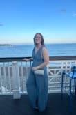 Really loved the style and color of this jumpsuit! I wore this to a wedding. The only thing to be wary about is how deep the cut is, but I used fabric tape to fix it to my liking. - Sarah J.