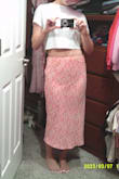 Great colors and fit. The skirt slips on very easily, there's also a zipper. The material is also very nice not itchy. I've gotten so many compliments! - Alyvia W.