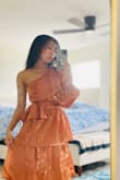 Bought this dress for my cousin's wedding but trial ran it at a friend's murder mystery gala and won classiest killer ( very comfortable and so cute with a pair of white ankle boots! Love the one shoulder look, particularly because the exposed shoulder has my tattoos - Summer Y.