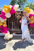 Such a fun and unique jumpsuit! I wore it for my bridal shower and absolutely adored it. The cape is long but it's supposed to be that way! - Jessica T.
