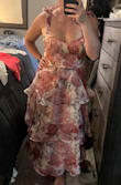 I originally found this dress on LTK and fell in love with it. I ordered a medium as that's my typical size, however I should've sized up to a large. I ended up exchanging it for a large and it fits nicely. However, the zipper gets stuck and the inside of the bodice is pretty itchy. It's a gorgeous dress but am on the fence if I want to keep it due to how pricey it is and the flaws mentioned above. - Mandi P.