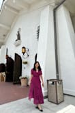 It's a beautiful dress especially the lower part but the fabric on the top part both front and back are loose that I have sew them. - Sherlly A.