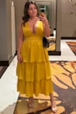 I'm obsessed with this dress! I received so many compliments and I felt like a Disney princess. I'm 5'1 so it fit a little longer than expected, but the length was perfect. The top was very revealing. I wore a deep V bra for support and I felt very confident. - Taylor P.