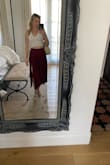 I love this shirt and will wear it with anything! I think I've used it 1000 times since I've bought it. It's so flattering, so comfortable, and just long enough where it doesn't show too much skin. I'm in love! Will probably buy a second one soon to have on hand if I'm being honest. Definitely recommend! - Amy L.