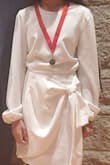 My daughter loved it! She choose to wear it at her piano performance. I was nervous about white dress might be see through in stage light but not this one! It was not see through at all and my daughter looked very nice in it. - Zankhana K.