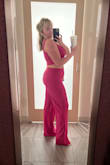 I wore this in 110 degree Vegas weather and never felt sticky or constricted! The fit is looser in the pants and very long. However; that just might be because I sized up a bit (I'm right in between a L and XL). For larger chested girls, I would size up in the top so you can comfortably wear a bra underneath as it's short. - McKayla A.