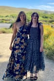 I had so much fun wearing this dress to a wedding. I knew I wanted to wear a floral dress, and I am so happy I decided on this one. I used the fit finder and it recommended a size medium for me. It fits perfectly! It was really long though. I am 5'5 so I had to get a few inches taken off the bottom. - Amy B.