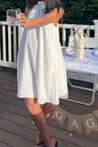 Really classy and pretty. It's comfortable with pockets but runs large/too long. - Lewam G.