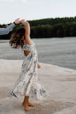 I bought this dress for my engagement shoot and was so happy with it! As someone who is pretty short it is hard to find longer dresses, but this was perfect from the fabric to the fit, etc. Very true to photos. Love that it was adjustable in the straps and back as it was slightly bigger in that area. 100% recommend! - Cassie H.
