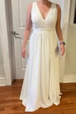 The Greek goddess vibes were strong with this one. It fit well and I loved that I could wear a bra with it, but ultimately it was just a bit too plain and modest for me. The slit was unnoticeable. - Christine F.