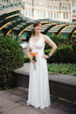 We eloped, but I still wanted something beautiful and to feel like a big wedding. This was so gorgeous, flowed beautifully, see photos. I wore flats and you can see it just floats above the ground, so at 5'11" take that into account and choose your shoes carefully if you buy this dress. I typically wear a size 6-8 depending on the brand and this thing fit like a glove. - Shannon C.