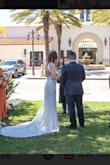 I got married at the Laguna beach court house and this was the perfect dress. It fit true to size. I did need to safety pin the neck but I do that with other clothing. The train I was absolutely beautiful. It was just long enough to feel like a wedding dress. - Mary M.