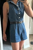 I've been wanting a jean-romper or short jean dress for this summer, this one won the contest because It had the collared neck plus belt loops so I'm able to wear my waist belts. It is very comfortable and flattering, goes great with white tennis shoes or heeled sandals. The only part of this great, well-constructed dress is under the arms it dips low so you can see your bra if that's all you have under it. I have a D-size chest so it would be pretty uncomfortable without, so that's the only thing I would change. - Carley J.