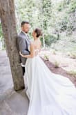 I never ever write reviews for anything. But this dress is simply stunning!! I looked and looked for a wedding dress that wasn't ridiculously expensive. When I came across this one, I was very skeptical, especially because it was on sale for $280 compared to the $1500+ dresses I was looking at. I figured for the price, I could at least try it on...and fell in LOVE with it. I purchased the jeweled belt from Lulus too and had them sew it on. I needed a few alterations to make it fit perfectly and it ended up being gorgeous and looking like a dress that costs thousands of dollars. No regrets, buy this!! - Jennifer G.