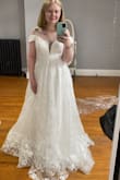 The dress is beautiful, but I'm just having issues with the zipper and it's not like the dress is small on me. It fits me perfectly and it's not too big either but the zipper just keeps on getting stuck and then the minute the dress is on I can't unzip it. Maybe it's best to return it? - Margaret S.