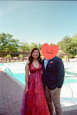 Overall this dress was really flattering and made me feel pretty wearing it. But for a person with no bust, I did feel self-conscious about the deep V and kept pulling up the top even with my straps adjusted. With heels, the dress did not need to be hemmed. I got so many compliments for my dress and the color! - Katie Y.