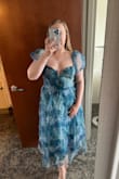 Before I placed the order for this dress, I read other reviews stating that the bust was too big and to size down if possible. I still placed the order in my regular size (12/XL) but if I could, I would order a 10/L instead. I didn't have time to find a local tailor to take in the dress in the chest to fit properly so I relied on fashion tape and pasties to not flash anyone even after tying the bow in the back as tight as possible. I got lots of compliments regardless though! - Autumn G.