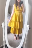I loved this material and the bright yellow! A very fun yet formal dress. Fit true to size but for bustier girls, it may be quite revealing. - EMILY S.