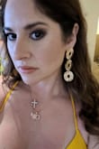 These earrings are so pretty! They are long but not heavy at all. - Dorvil A.