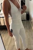 Beautiful! Really pretty and bridal feeling. Fits great! I got a small. - Maty P.