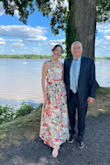 This dress was perfect for a summer wedding!! It was light for a hot day and was super comfortable and flattering. The colors in it are stunning, and I got lots of compliments. The background color is more off-white (rather than white as it appears in the photos online) which was good for a wedding bc I always get nervous about that! One thing I would change is that the zipper gets caught while going up a bit in the back even though there's plenty of room. I actually had to have customer service send me a second one (which was much better than the first and they were very helpful!) but still needed 1-2 people to help me get the zipper up lol. Still highly recommend the dress. I would just have a friend on hand to help you get it on!! - Claire M.