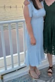 Great purchase for a semi-formal wedding! I would definitely purchase it if you are debating whether or not to get it. I am between a small and medium, and the medium fit perfectly! Only thing was that it had some extra thread hanging off parts of it that I had to cut off- but it was hardly noticeable. It didn't affect the look of the dress after I cut off the extra thread. I received many compliments! - Julia G.