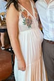 Wore for my engagement party. Followed other review guides, and I'm very pleased with this dress. Works great on my small chest. Got lots of compliments and can't wait to wear it on every tropical vacation in the future. The skirt is pretty see thru though, but was fine with a nude panty. - Jackie C.