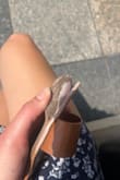 The sole of one of the sandals separated after wearing it only a few times. - Emily S.