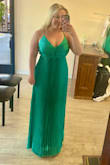 I absolutely LOVE this dress! I was scared that I wouldn't be able to be comfortable in this dress since I have a bigger chest but it fits perfectly! You can adjust the chest space from the back. Cannot wait to wear it for a wedding this month! The color is absolutely stunning too. - Grace K.