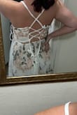 I love the floral embroidery work and the back of the dress is so beautiful! It fits true to size as well. - Emily C.