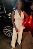 Purchased in white.
This jumpsuit was absolutely amazing and I felt sexy in it!  I was worried about my boobs because I'm slim but Busty. I was able to use boob tape to secure my breast because you cannot wear a bra with this jumpsuit - Kelly K.