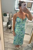 The color of the dress is much darker/greener in person - not the pretty blue like in the picture. Also, the metal V at the chest is poorly made and seems like it'd break through the thin outer material in no time. - Caroline D.