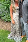 This dress is stunning. It fit perfectly and the corset back would allow it to fit a variety of busts/waists. It does run long, so might need to be altered for shorter girls. I received so many compliments the night I wore this and I can't wait to wear it again! - Ash Z.