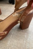 I absolutely love these. But unfortunately, I probably only wore them maybe 10 times and they fell apart. They are not wooden or leather. More like plastic. Such a shame. - Bree F.